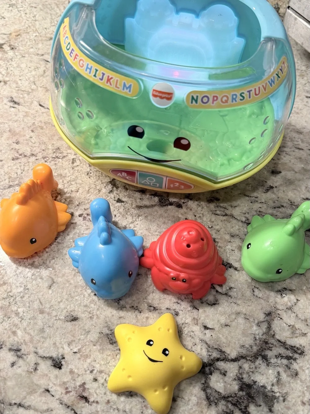 Fisher-Price musical Yellow, Blue and Orange Learning Activity Toy - aquarium